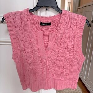 Get some prep in your step! Adorable pink high waist sweater vest. NWOT, cute!